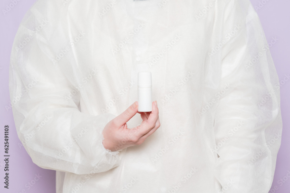 Physician medicine doctor hold drop bottle for eye, nose or ear