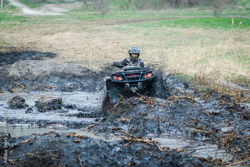 ATV, buggy, quad and UTV offroad vehicle rally in dust with mud splash. Extreme, adrenalin. 4x4 ATV, buggy, quad and UTV offroad vehicle rally in dust with mud splash. Extreme, adrenalin. 4x4
