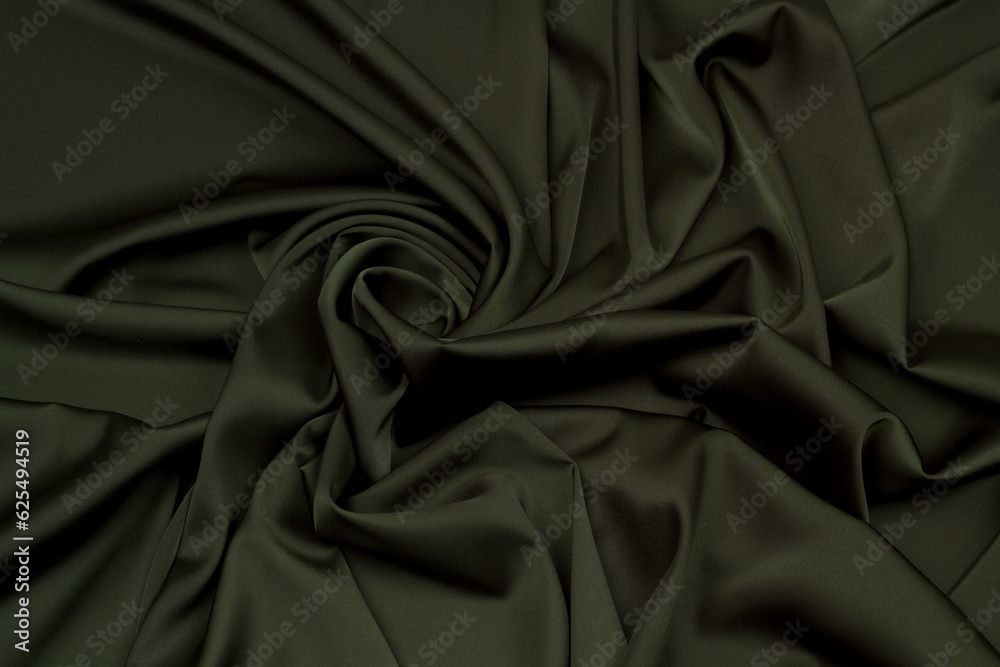 Fabric satin silk drapery. Green textile