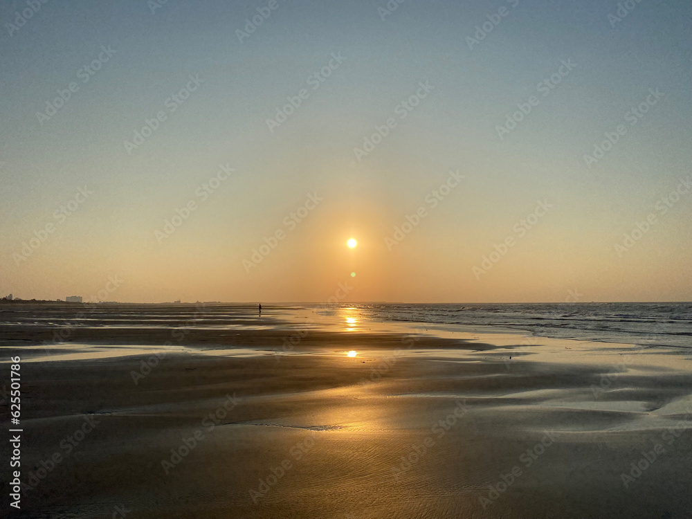 Naklejka premium sunset on the beach