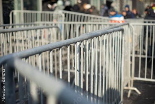 Fence at public event. Grey fence to block crowd. Steel frame. photo