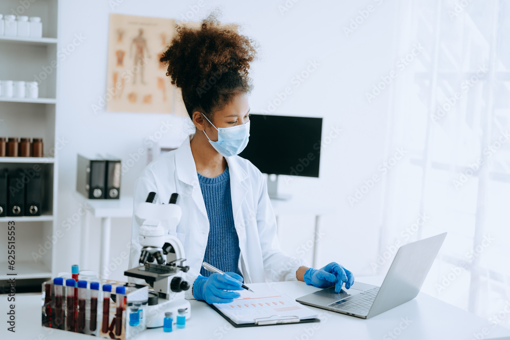 Modern medical research laboratory. African female scientist working with micro pipettes analyzing biochemical samples, advanced science chemical laboratory for medicine. . Modern medical research laboratory. African female scientist working with micro pipettes analyzing biochemical samples, advanced science chemical laboratory for medicine. .