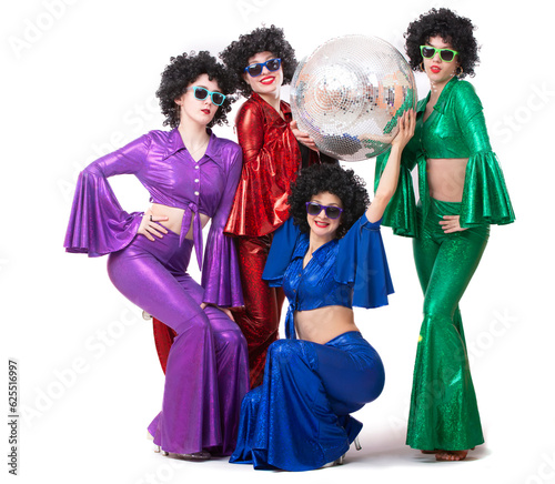 Girls in glasses and colorful disco costumes pose with a disco ball. Disco party. Halloween costume.