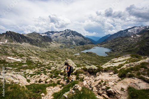 Young hiker girl summit to Montardo Peak in AIguestortes and Sant Maurici National Park, Spain © Alberto Gonzalez 