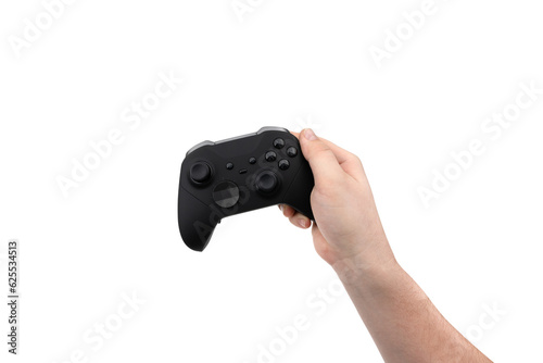 Joystick in hand on a white background. Gamepad in hand closeup isolated on white background.