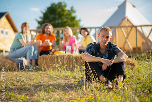 Photography At nature in front of the camera charismatic and handsome man posing to the came