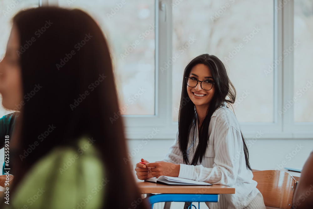 A black-haired female student wearing glasses is attentively engaged in a modern classroom, embracing education and learning with focus and curiosity A black-haired female student wearing glasses is attentively engaged in a modern classroom, embracing education and learning with focus and curiosity