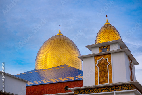 Dome of the mosque against blue sky, Padang, Sumatra Barat, Indonesia photo