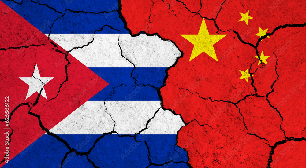 Flags of Cuba and China on cracked surface - politics, relationship concept