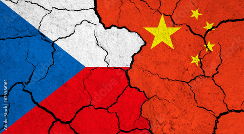 Flags of Czech Republic and China on cracked surface - politics, relationship concept