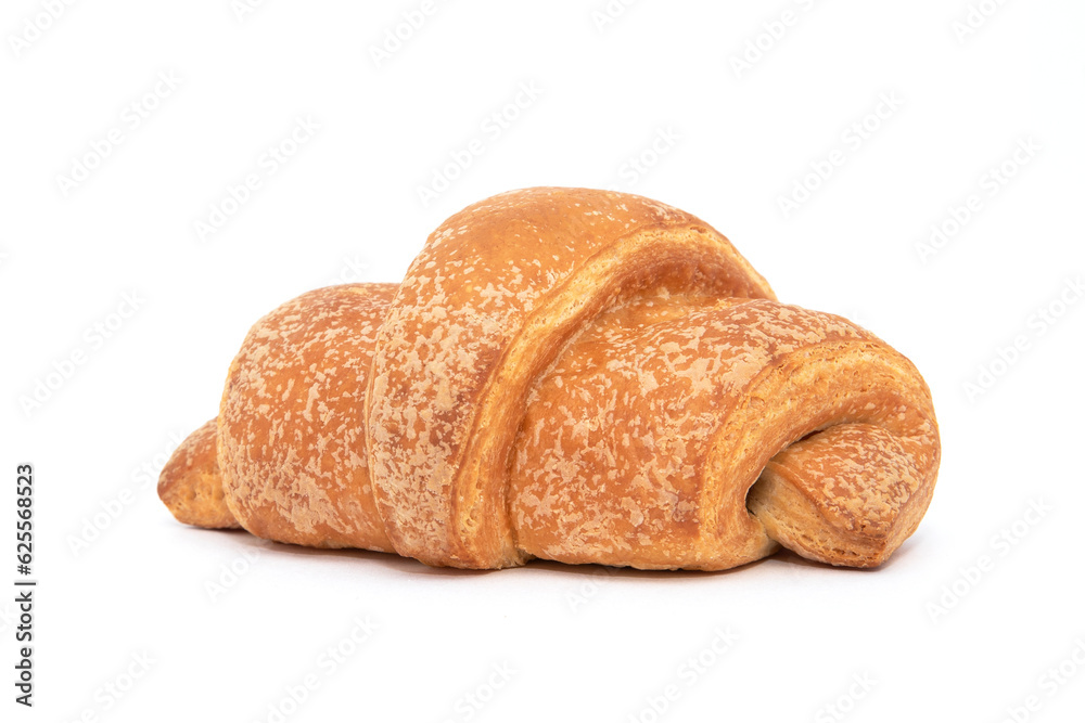A small croissant with a shadow lying on a white background, isolated. Fresh pastries for the bakery A small croissant with a shadow lying on a white background, isolated. Fresh pastries for the bakery