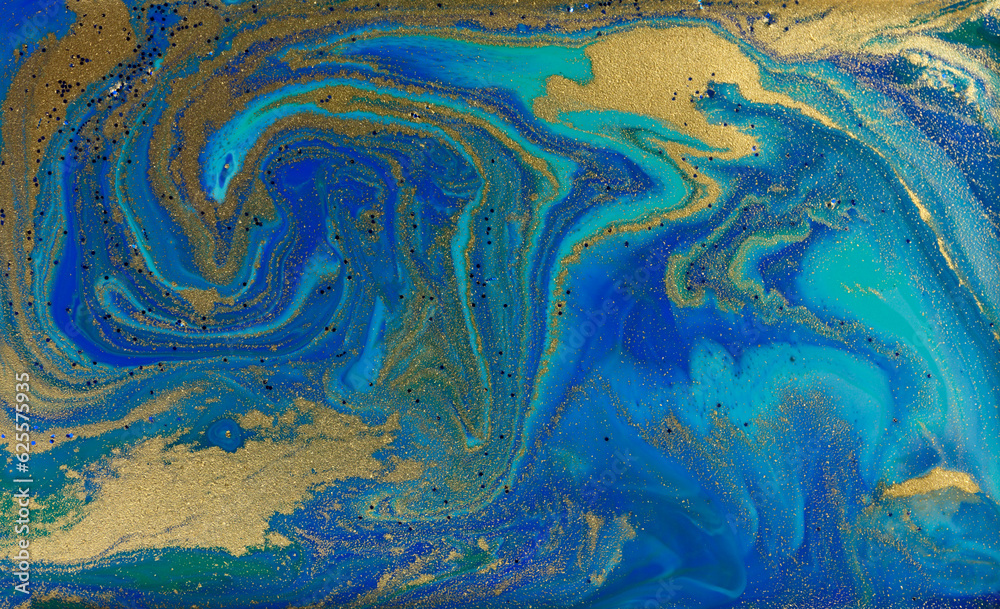 Golden Dust on Liquid Blue Ink Wave Background.