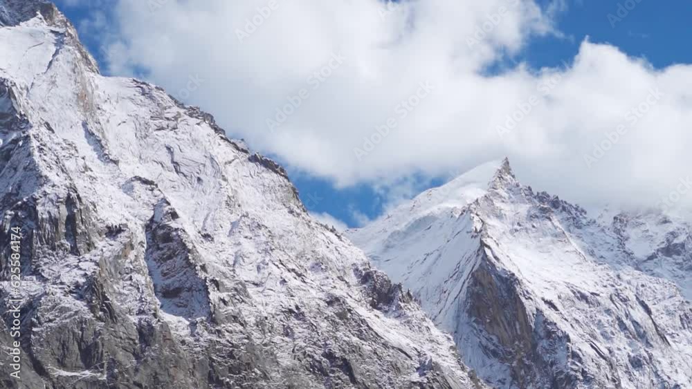 Snow covered mountain peaks of Spiti valley during the winter season at Lahaul and Spiti district in Himachal Pradesh, India. View of snow covered mountain peaks of Spiti during winter. Snow covered mountain peaks of Spiti valley during the winter season at Lahaul and Spiti district in Himachal Pradesh, India. View of snow covered mountain peaks of Spiti during winter.