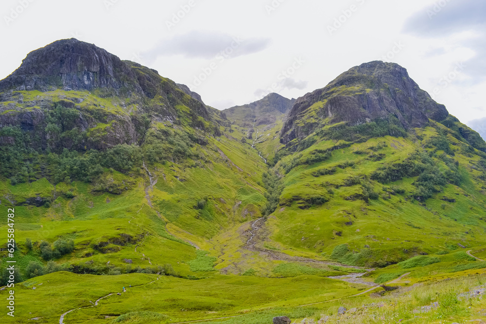 Green mountains and hills of scotland in the Highlands