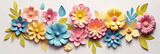 Wide format paper art flowers composition in front of light background