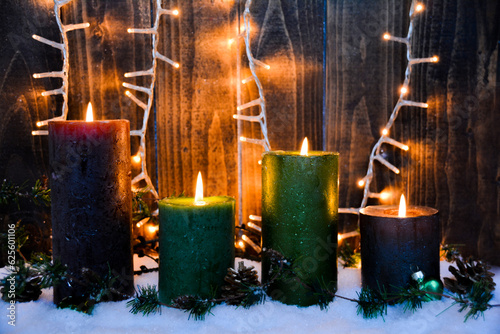 christmas candles in the sn...