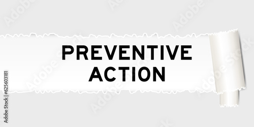 Ripped gray paper background that have word preventive action under torn part