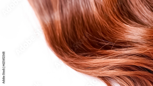 Brown shiny hair isolated on white background. Background with copy space. 