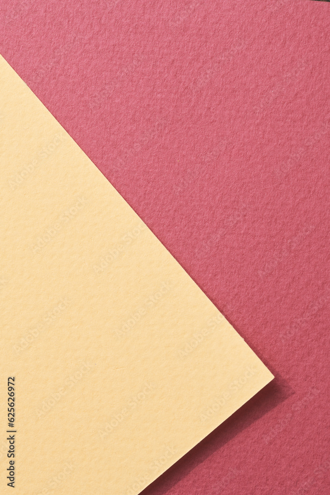 Rough kraft paper background, paper texture red burgundy yellow colors. Mockup with copy space for text. Rough kraft paper background, paper texture red burgundy yellow colors. Mockup with copy space for text.