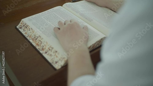 Jewish man read from the Jewish Bible Torah	
