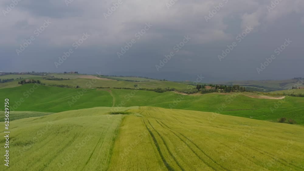 Green meadow in Tuscany in the Orcia valley Italy Aerial view Green meadow in Tuscany in the Orcia valley Italy Aerial view