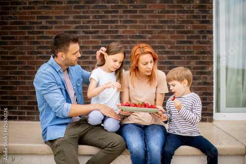 Family with a mother, fathe...