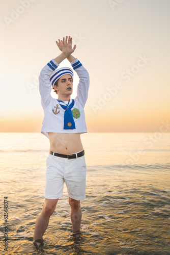 Italian man cosplay Gappy from the anime jojo. Man dressed as a sailor. Blue uniform, amazement. photo