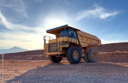 Mining truck in open-pit mining. Construction equipment on soil transport. Haul truck at construction site. Mining civil works and Earthmoving. Off highway Trucks on construction. Haul dump truck.