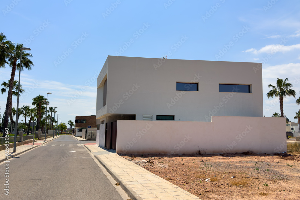 Prefabricated home under construction. Construction of Modular house. Villa under construction. Prefab residential home building on Construction site near beach of Mediterranean sea. Home renovation. Prefabricated home under construction. Construction of Modular house. Villa under construction. Prefab residential home building on Construction site near beach of Mediterranean sea. Home renovation.