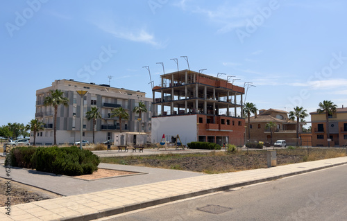 Construction of modern house near coastline. Townhouse Construction. Home renovation near ocean. Villa under construction. Luxury villa under construction near beach of Mediterranean sea.