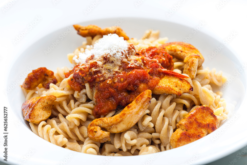 pasta fusilli with spicy chicken meat and tomato sauce pasta fusilli with spicy chicken meat and tomato sauce