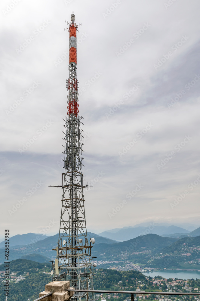 The large antenna on the summit of Mount San Salvatore overlooking Lugano, Switzerland and its lake