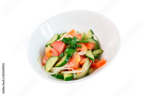 simple vegetable salad in a white plate, healthy meal, vegetarian meal