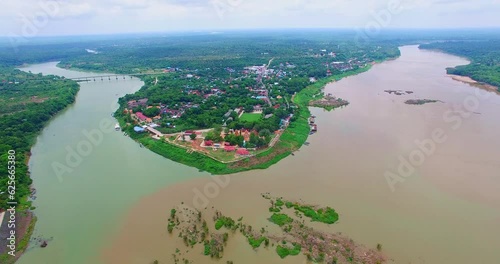 Aerial view amazing two colors in two rivers at three junctions in Khong Chiam Ubon Ratchathani Thailand..Mekong river the border between Thai and Lao..islands in the middle of Kong river background. photo