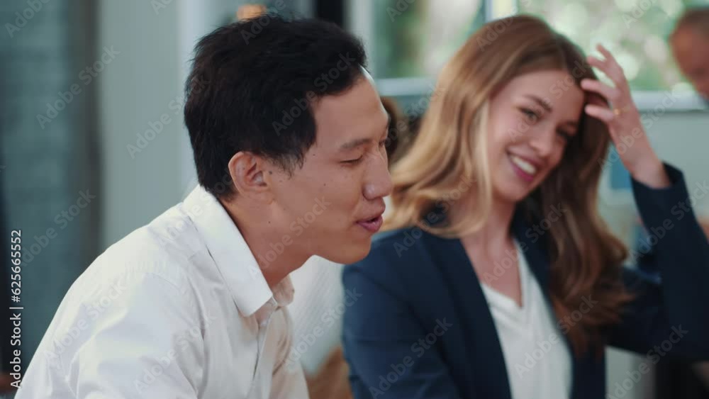 Lifestyle portrait of male marketing intern smiling and talking during relaxed office meeting Lifestyle portrait of male marketing intern smiling and talking during relaxed office meeting