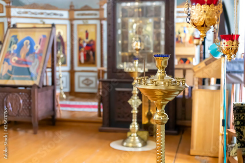 Pendant oil lamp in the orthodox church. Religious paraphernalia. Orthodox Church. Oil lamp close up.