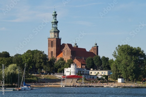 View from the lake on the co-cathedral basilica of the Holy Trinity in Chelmza.