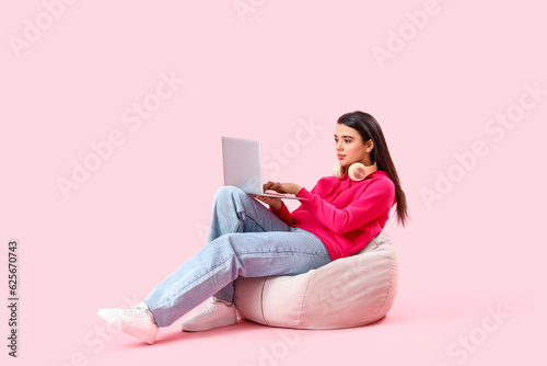 Young female programmer wit...