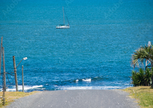 sailboat at sea as seen from the street