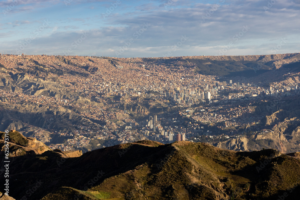 View from the landmark Muela del Diablo over the highest administrative capital, the vibrant city La Paz in Bolivia - traveling and exploring South America