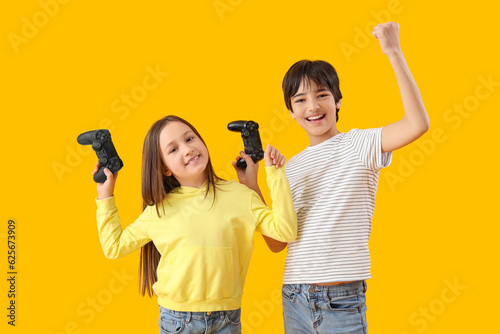 Children with game pads on ...