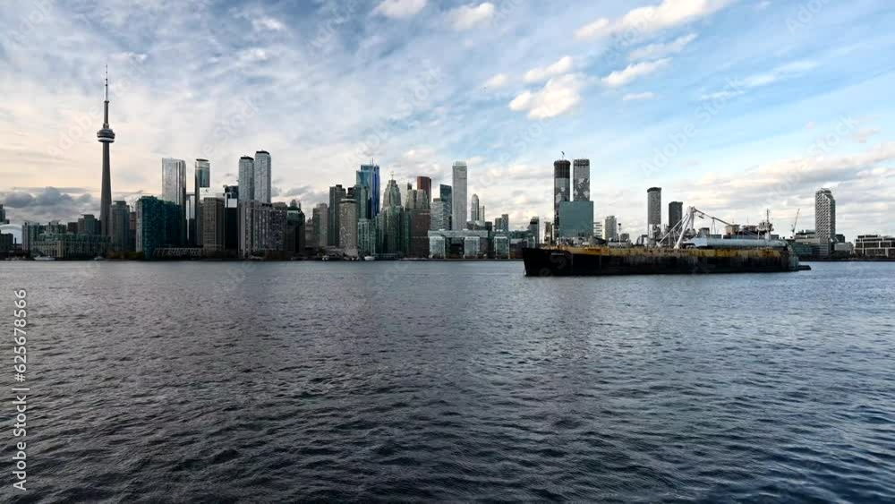 Toronto skyline view from the Ontario lake in the sunset Toronto skyline view from the Ontario lake in the sunset