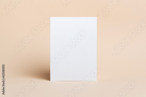 Blank paper card mockup with copy space on beige background