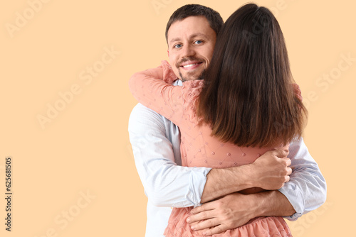 Happy young couple hugging ...