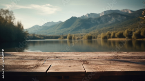 The empty wooden table top with blur background of summer lakes mountain. Exuberant image.