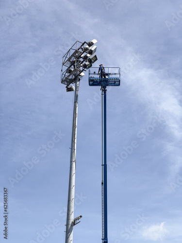 Repair and maintenance of stadium lighting by a city employee