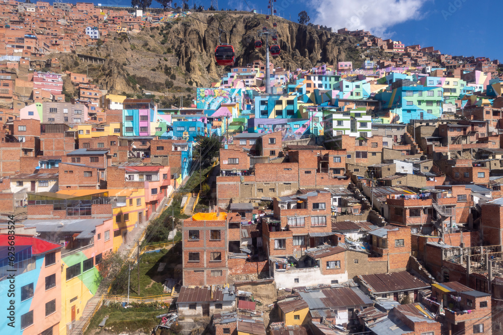 Barrio Chualluma, the painted neighborhood in La Paz, El Alto in Bolivia, South America - both artwork and hope for change and a better future - viewed from the red cable car 
