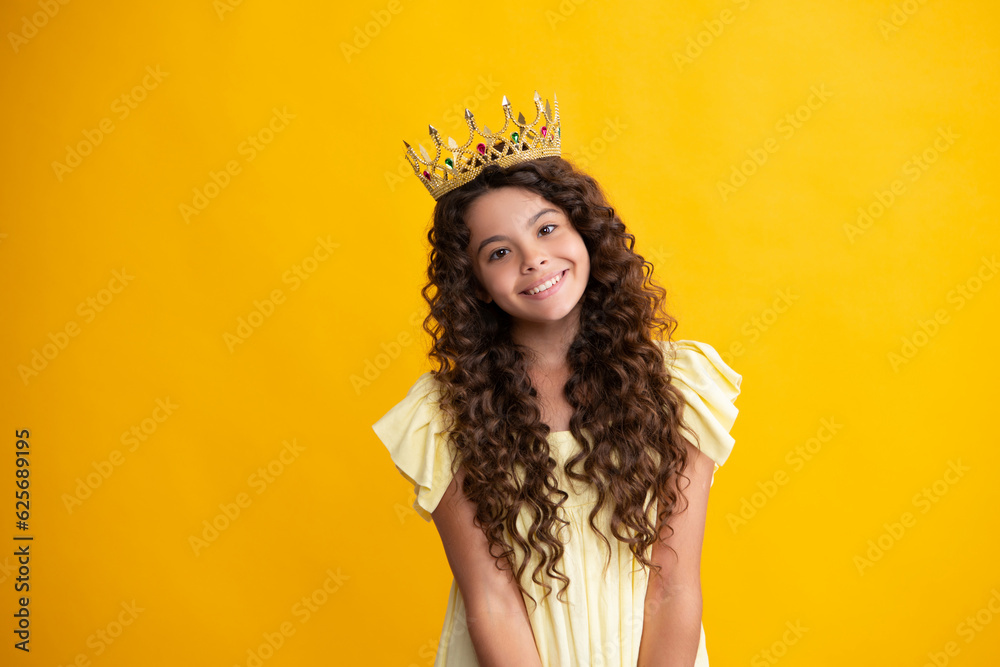 Little queen wearing golden crown. Teenage girl princess holding crown tiara. Prom party, childhood concept. Happy teenager, positive and smiling emotions of teen girl. Little queen wearing golden crown. Teenage girl princess holding crown tiara. Prom party, childhood concept. Happy teenager, positive and smiling emotions of teen girl.