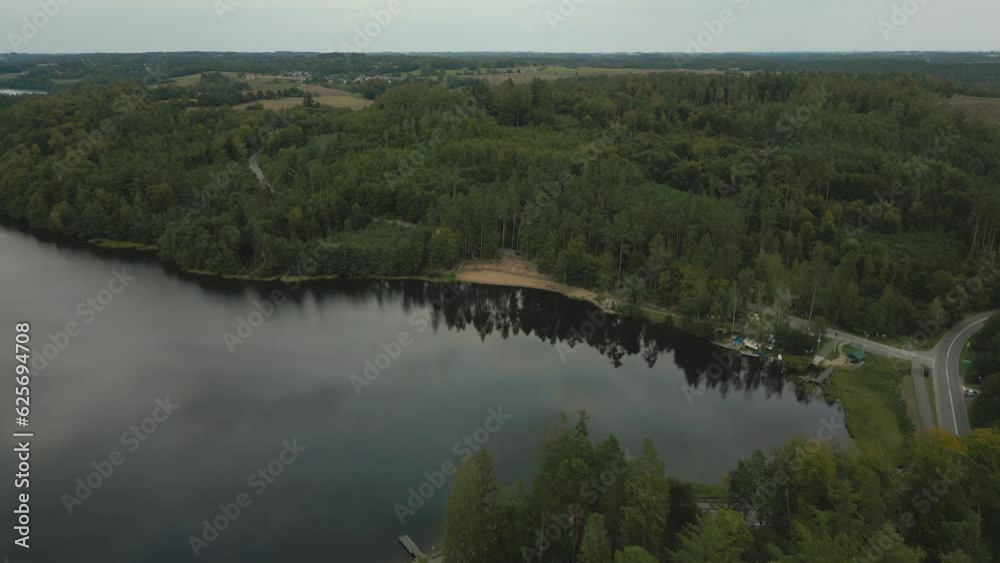 Aerial shot of Wegorzyno lake. Late evening scenery. Moody light. Early autumn. Kashubia, Poland