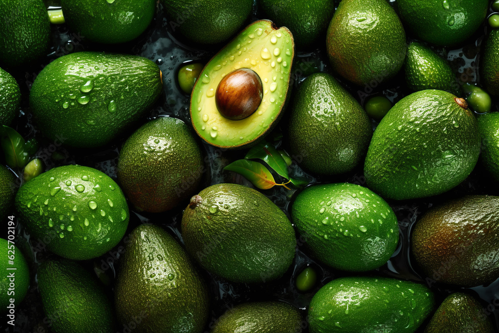 Fresh Green Avocados with Droplets of Water and Leafs, Top-View Close-Up Background Fresh Green Avocados with Droplets of Water and Leafs, Top-View Close-Up Background
